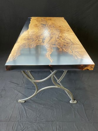 Three-hundred-year-old solid oak and epoxy resin table