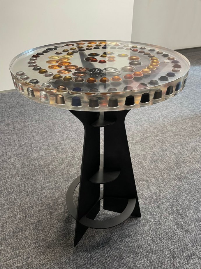 Table with Nespresso capsules