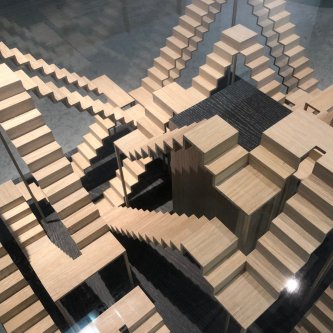 Coffee table in a glass cube, staircase labyrinth