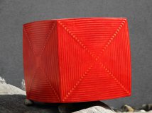 Swollen&quot; cube in red lacquered black valchromat